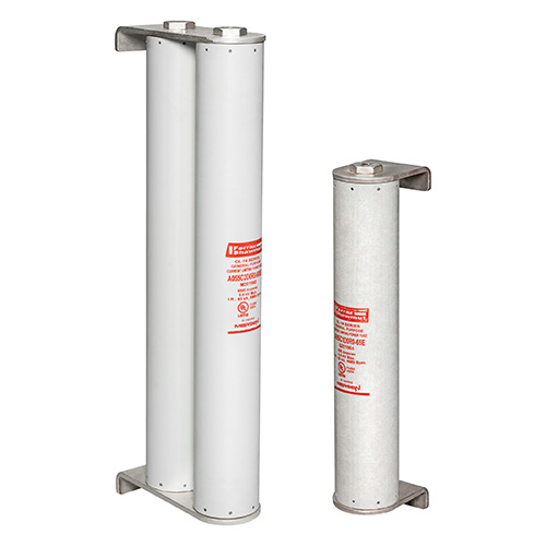 Two white cylindrical air springs with red labels, differing in height.