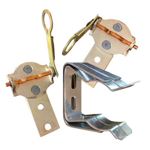 Three metal and plastic hardware components with various shapes and a yellow loop.